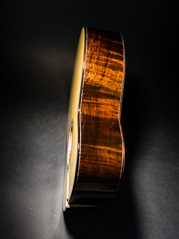 The side view of the curly Brazilian rosewood