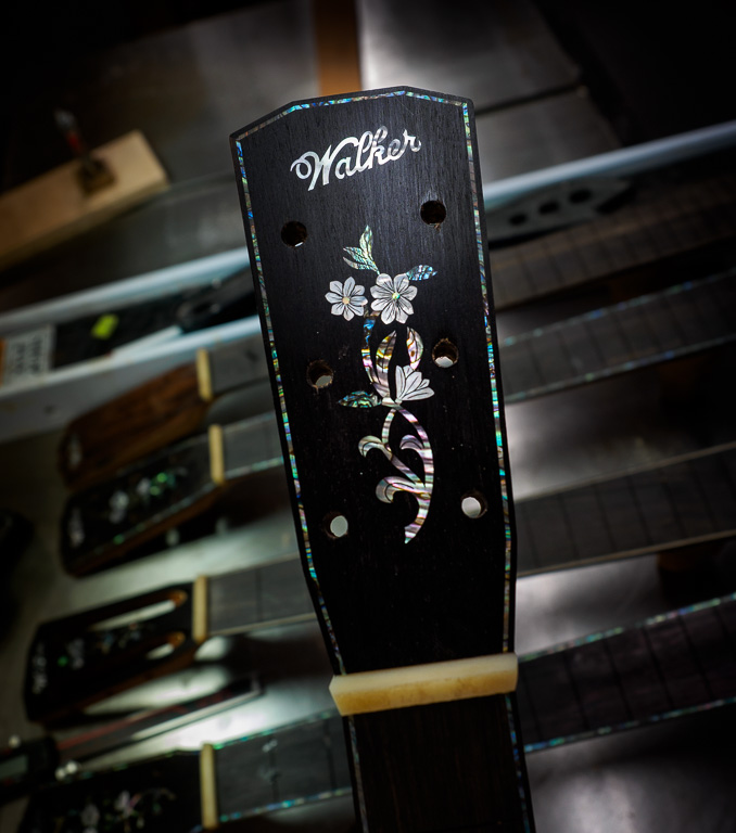 Blue Paua abalone border on headstock and fingerboard