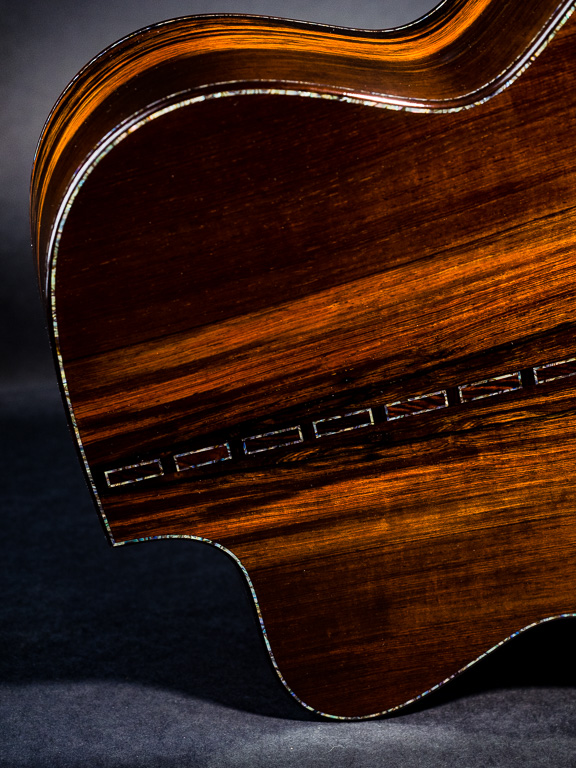 Abalone trim on straight grained Brazilian rosewood